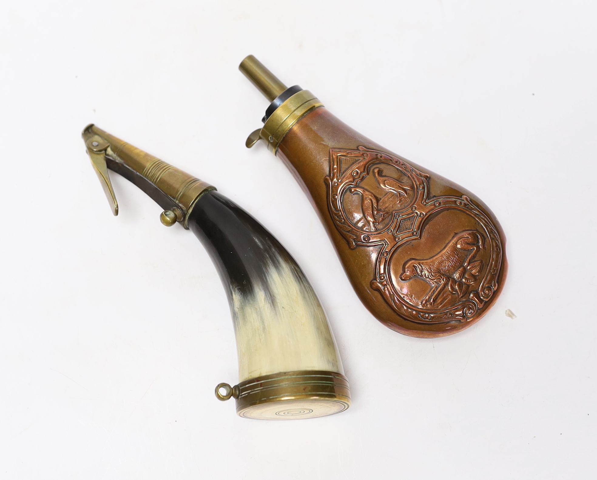 A brass mounted powder horn and a copper powder flask, horn 18cm